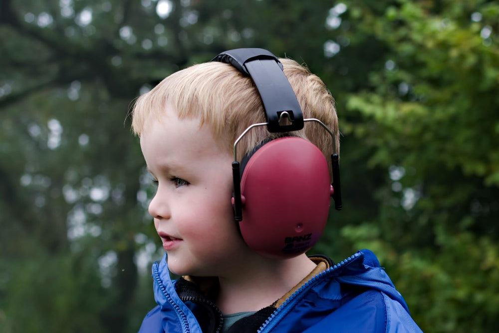 BANZ Kids Earmuffs Maroon worn at a game demonstrates protective comfort