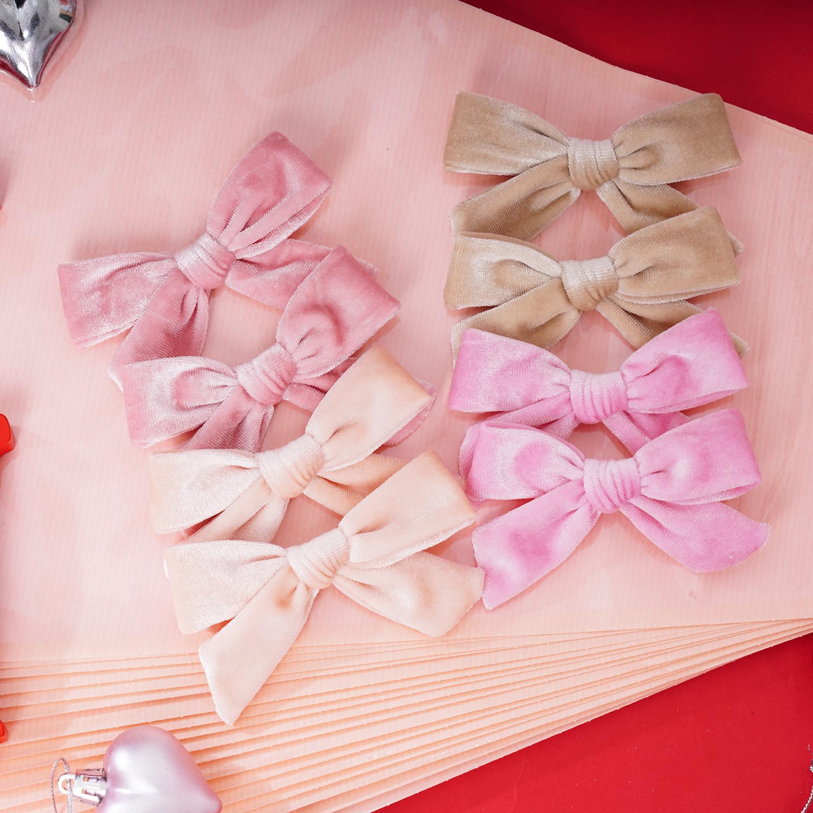 Baotongle velvet bow light pink close-up shows soft, luxe velvet texture and smooth edges.