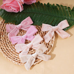 Baotongle velvet bow peach pink flat lay highlighting eight-piece color variety.