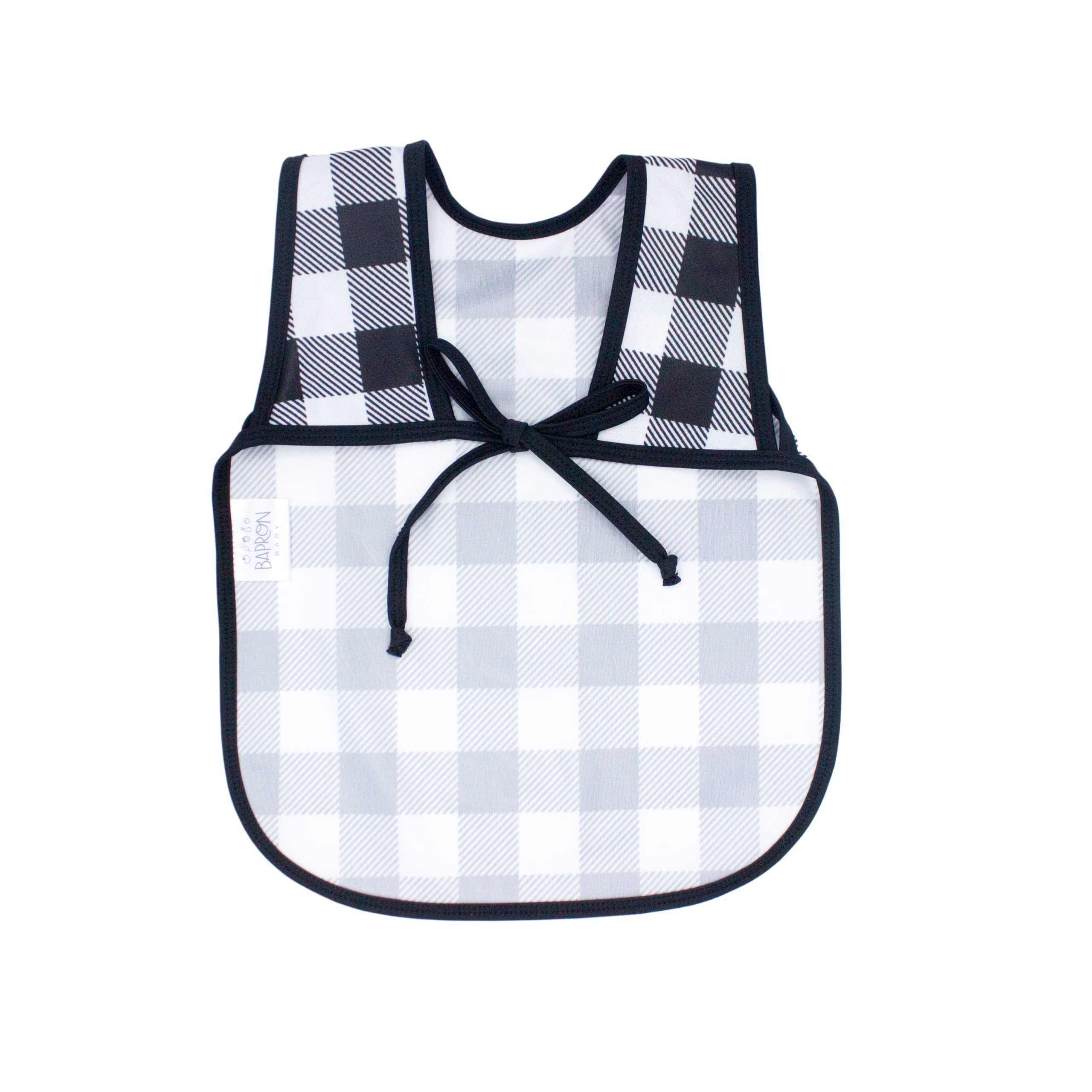 Close-up of fabric on BapronBaby white buffalo plaid bapron emphasizing quick-drying, stain-resistant material.