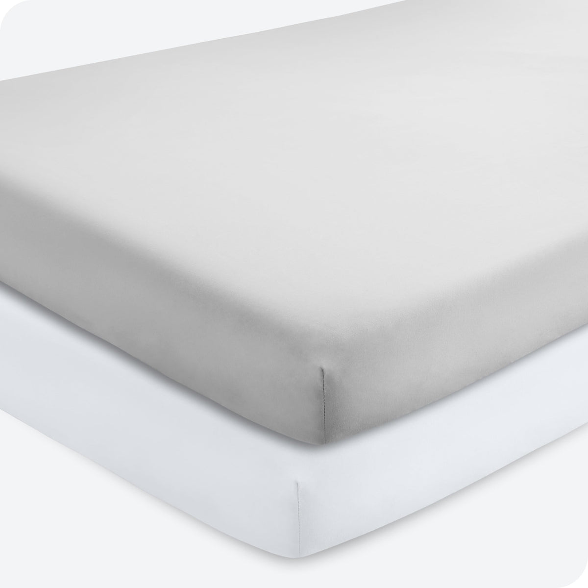 Bare Home 2-pack fitted crib sheets in cloud grey show elasticized stretch for snug crib fit.