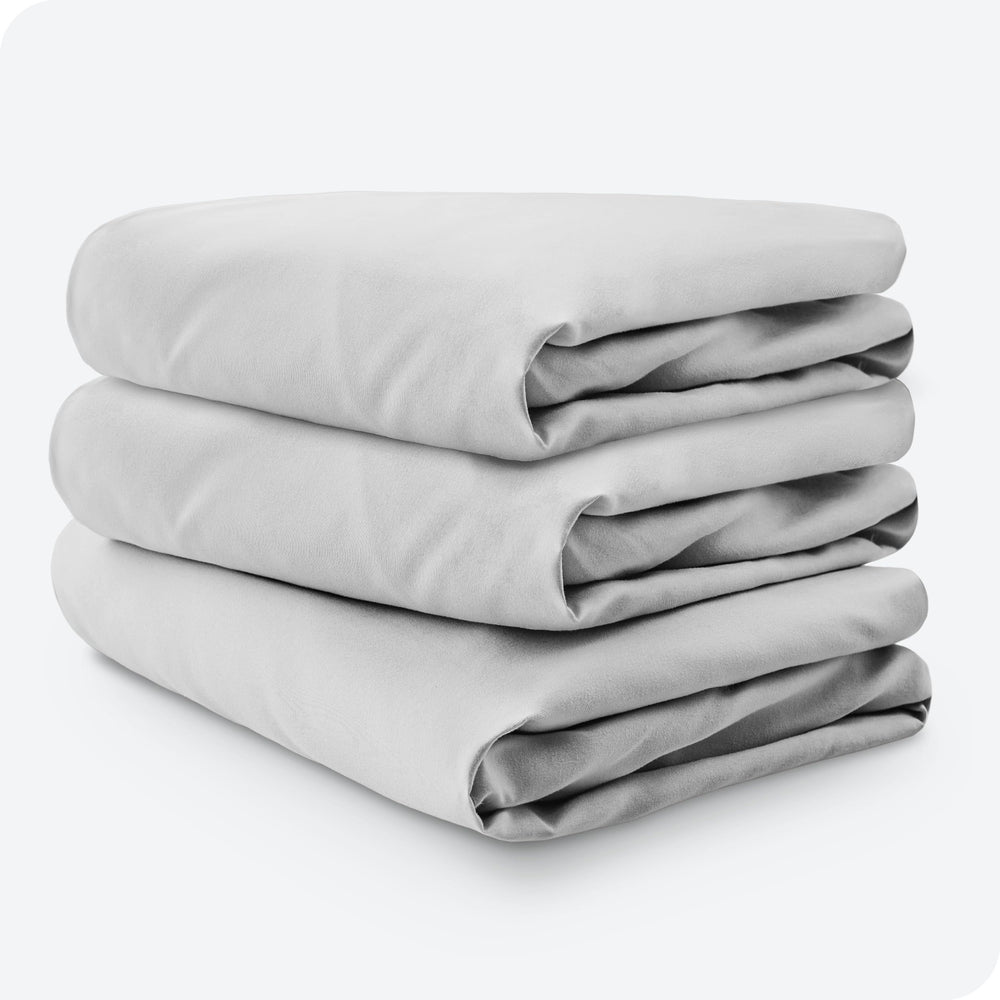 Bare Home cloud-grey sheet in nursery setup suitable for nap-time and bedtime