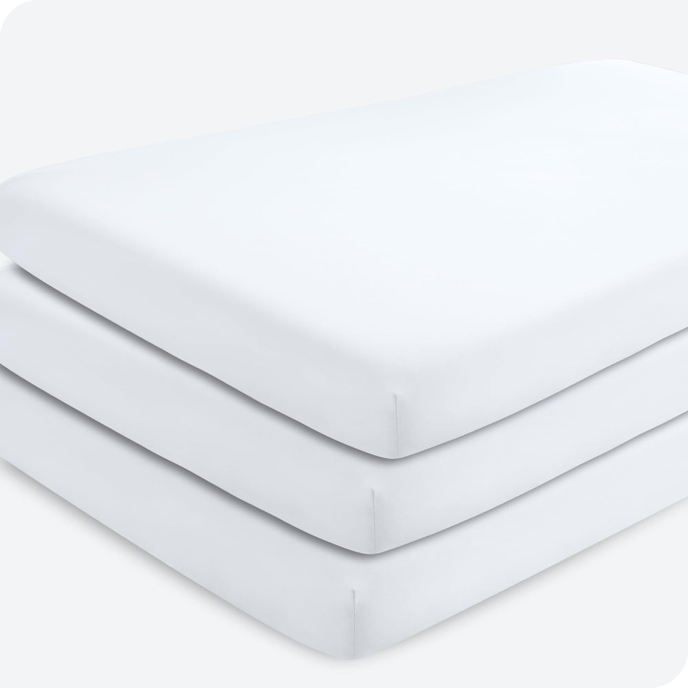 Bare Home 3-pack fitted crib sheets in white packaging show multi-pack convenience.