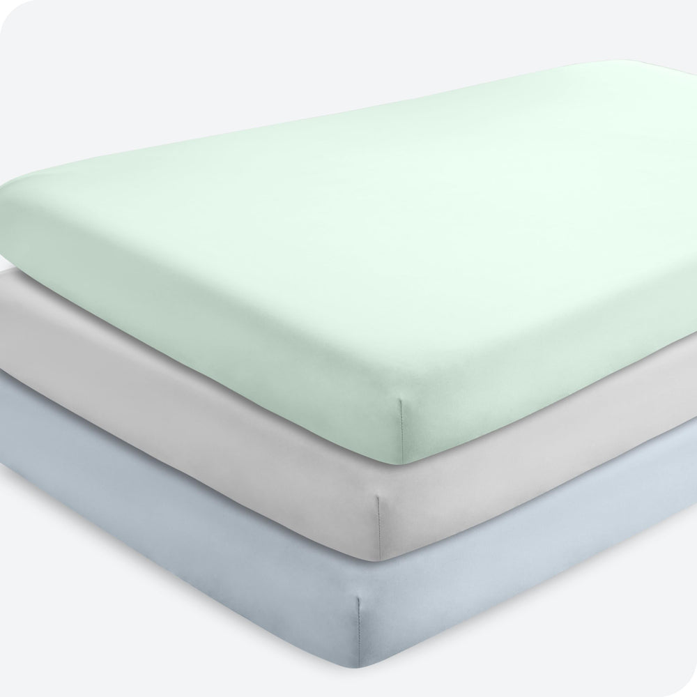 Bare Home 3-pack crib sheets Sky Blue show soft, breathable microfiber surface.