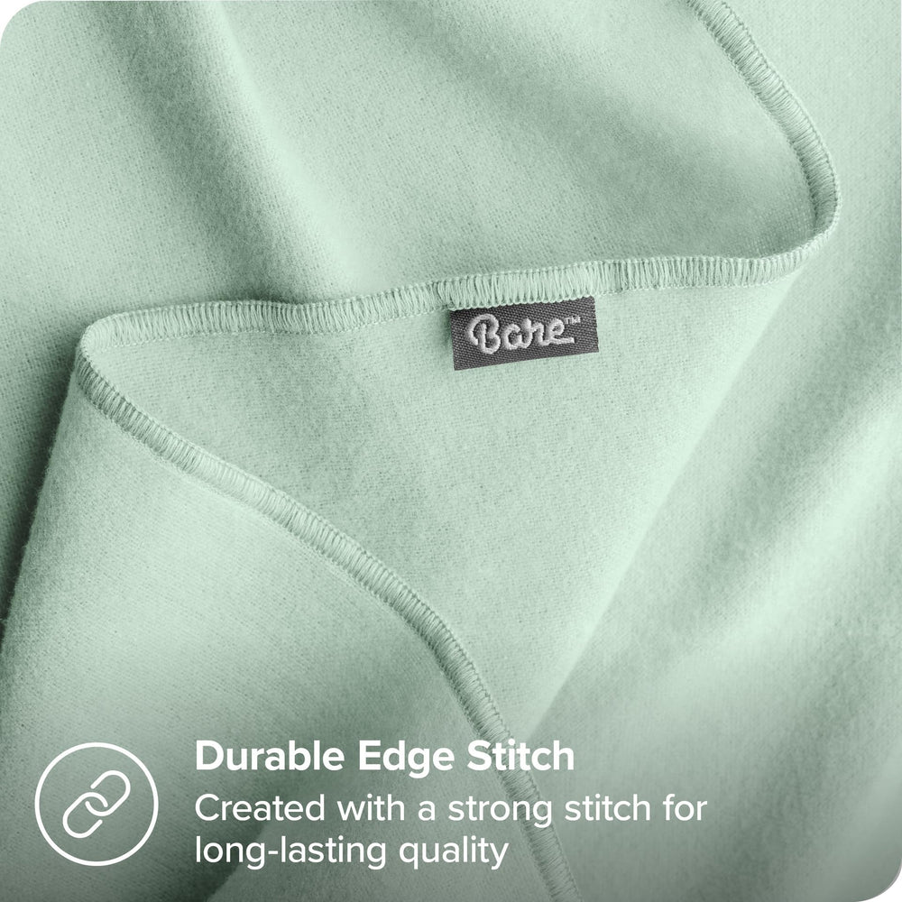 Bare Home baby naps with mint blanket illustrating swaddling comfort.