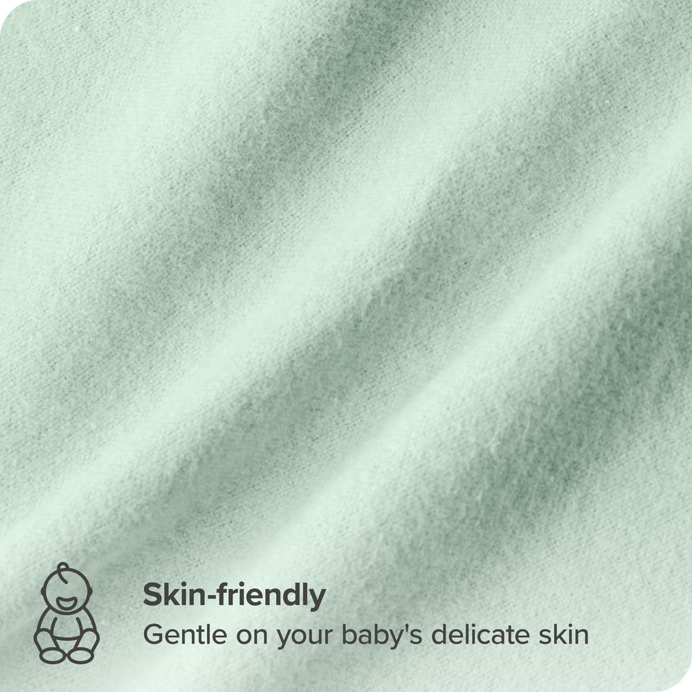 Bare Home baby nursery setup with mint blankets for gentle warmth.
