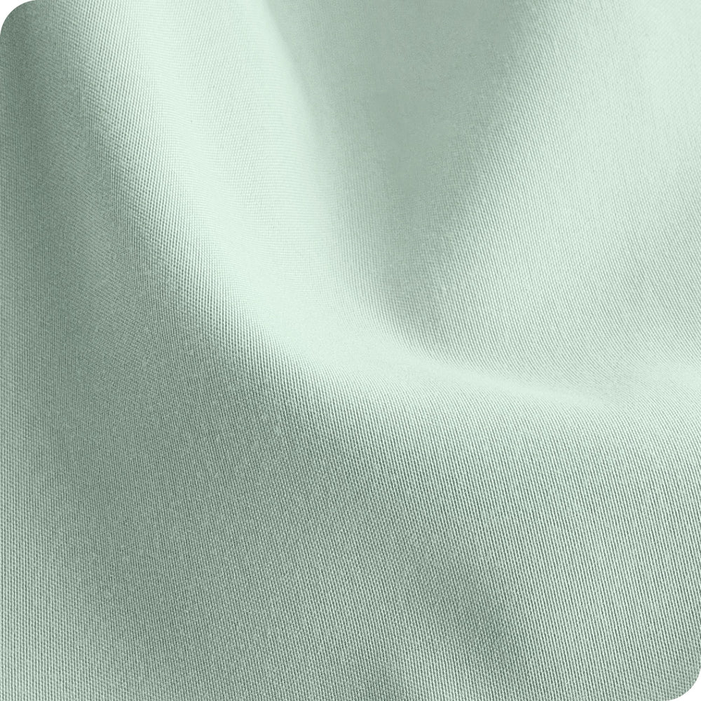 Bare Home breathable microfiber crib sheet emphasizes gentle airflow for baby comfort.