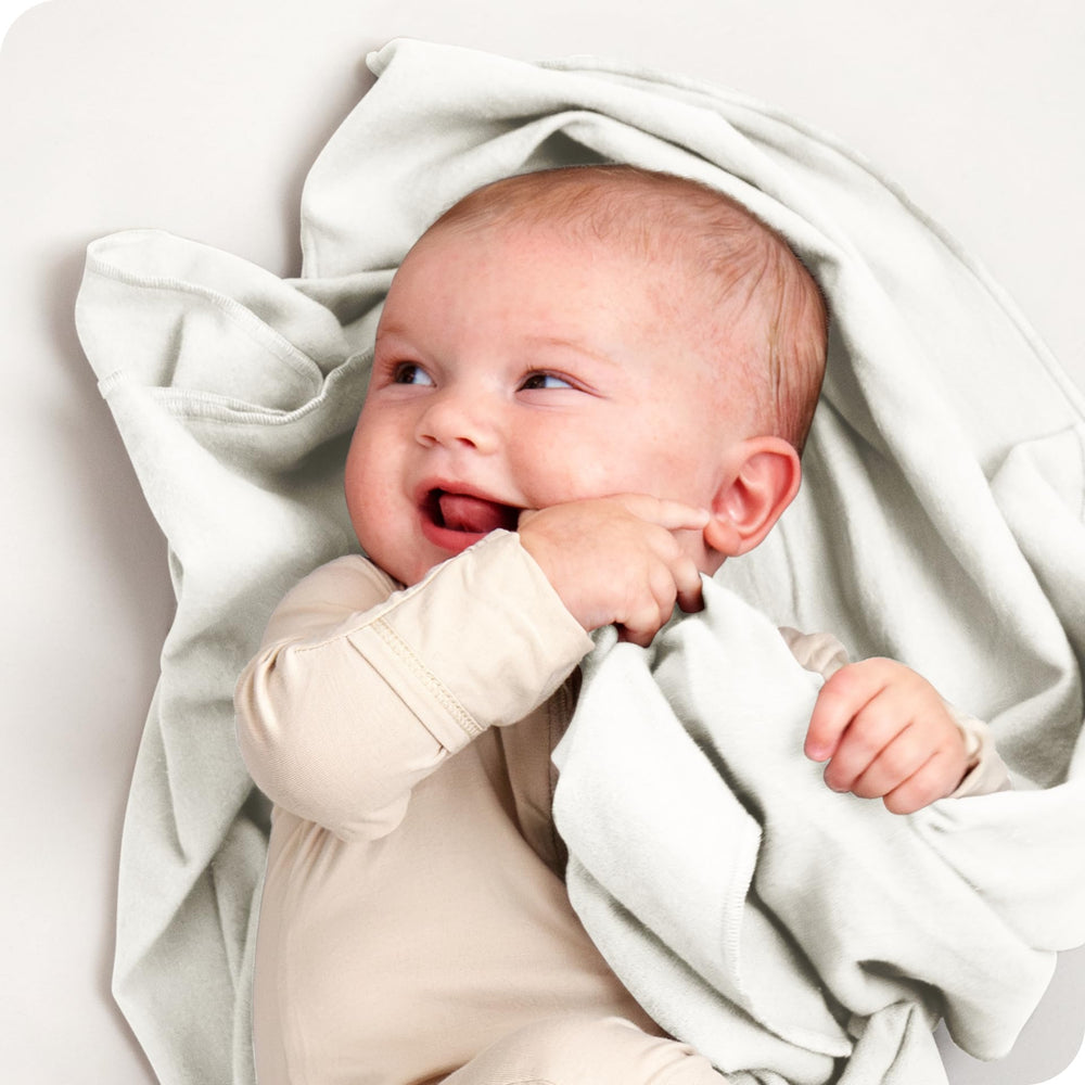 Bare Home cotton flannel receiving blanket cream, packaged set, showcasing soft warmth for baby.