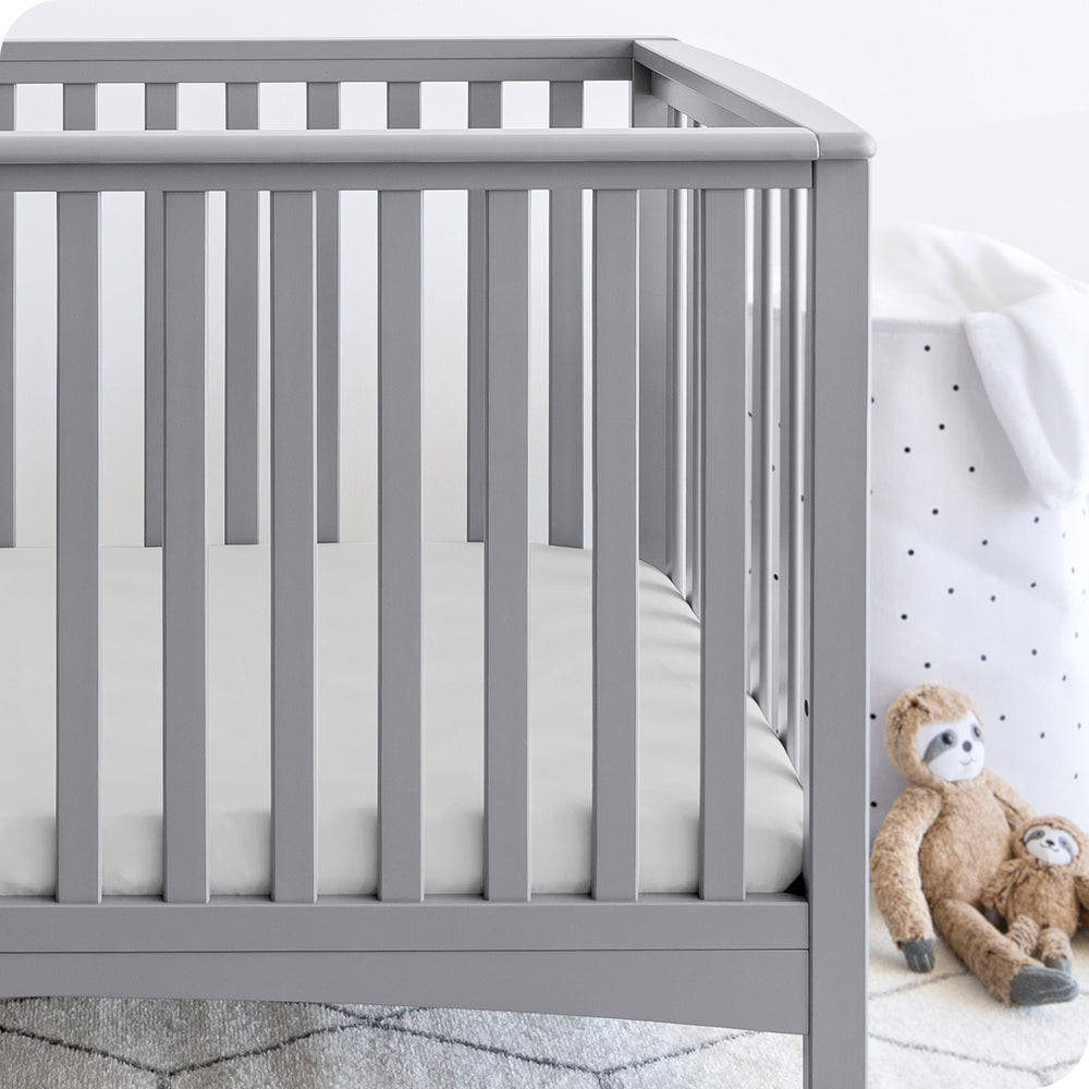 Bare Home cloud grey crib sheet provides gentle touch and snug fit.