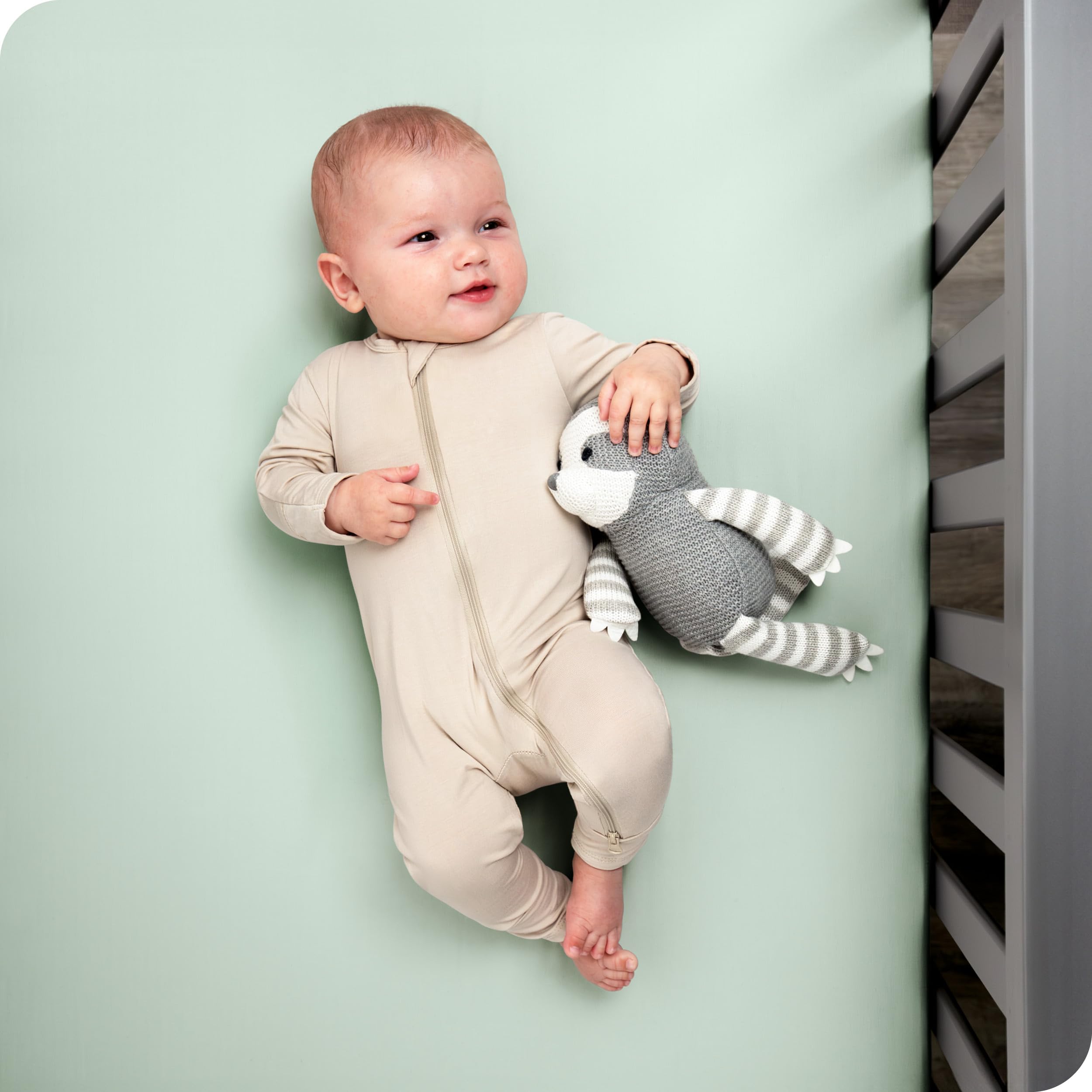 Bare Home crib sheet demonstrates fit on a standard crib mattress with secure elastic edge.