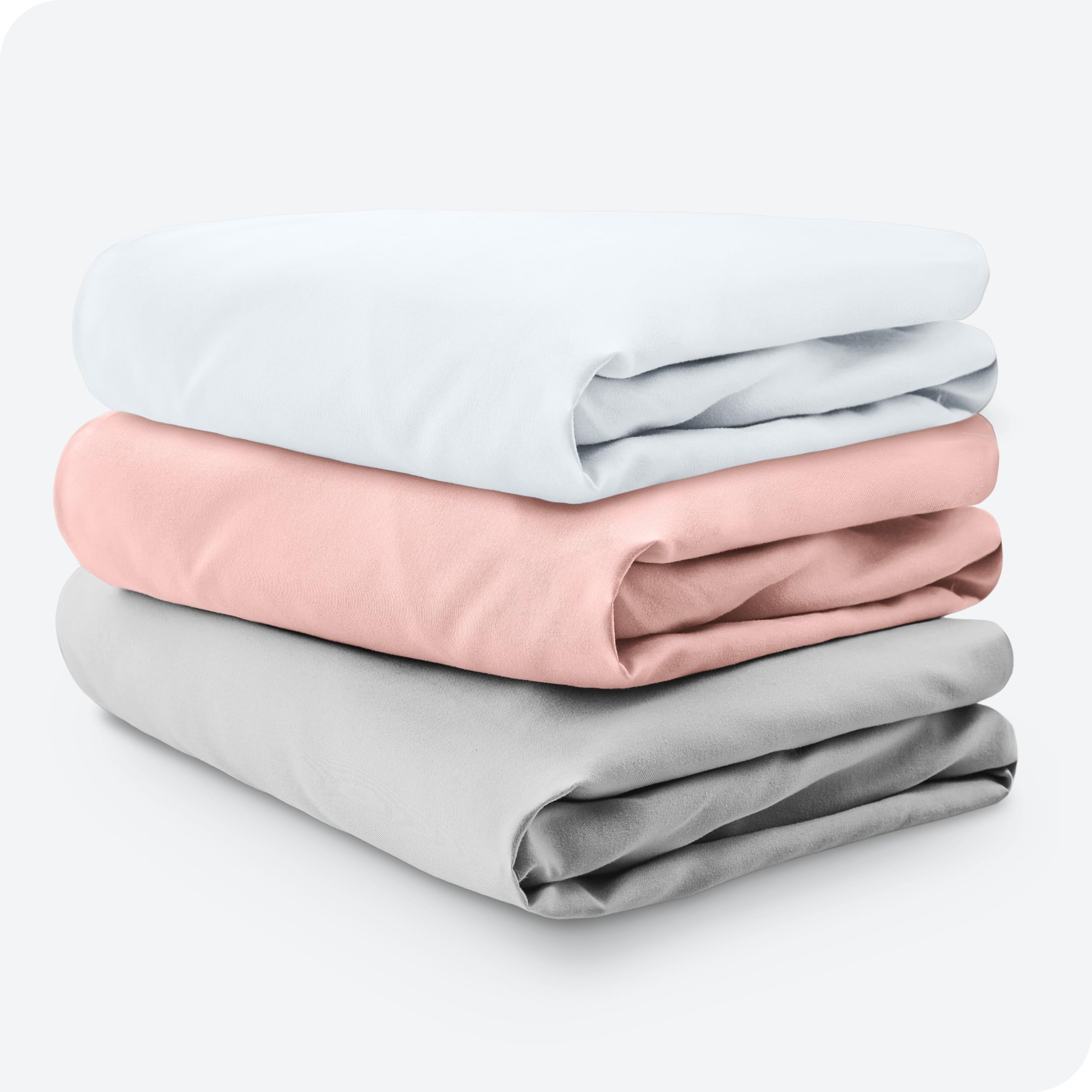 Bare Home fitted crib sheet demonstrates secure elastic fit on mattress edge.