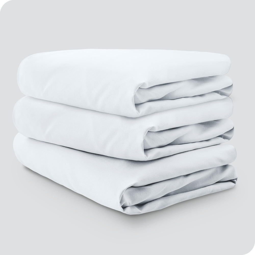 Bare Home machine-washable care label indicates easy cleanup after spills.