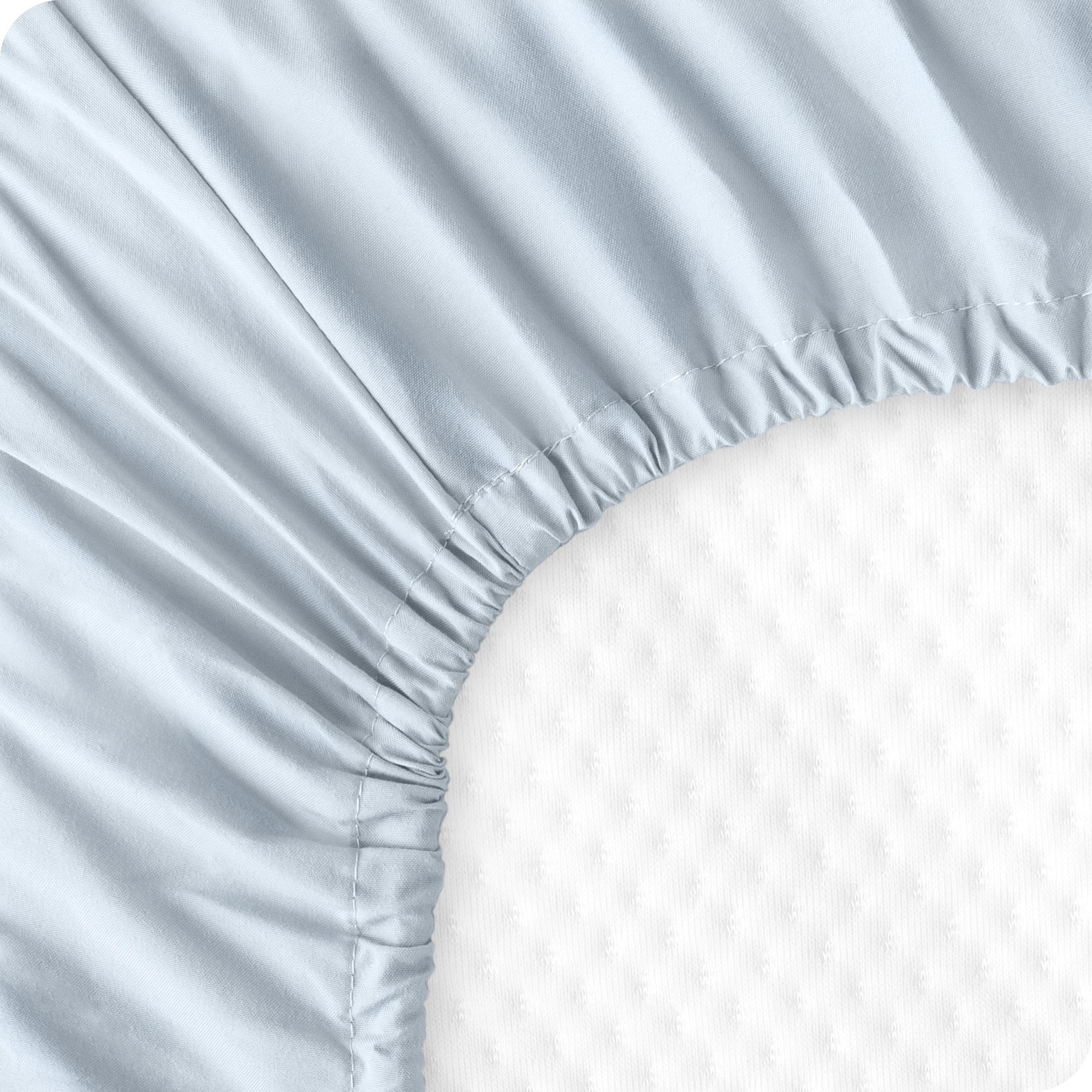 Bare Home machine-washable crib sheets for easy care.