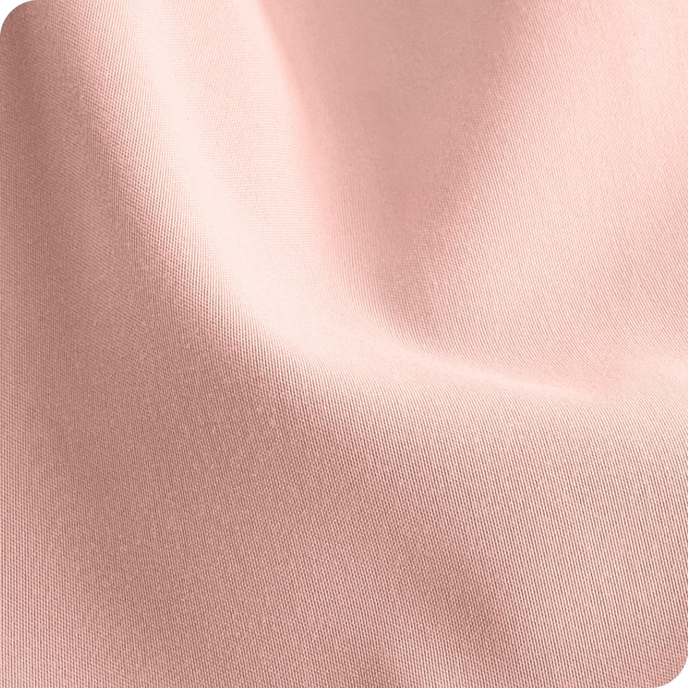 Bare Home pink slipper color crib sheets highlight gentle nursery styling.