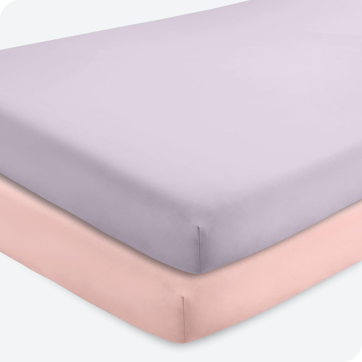 Bare Home pink slipper crib sheet on mattress for cozy sleep