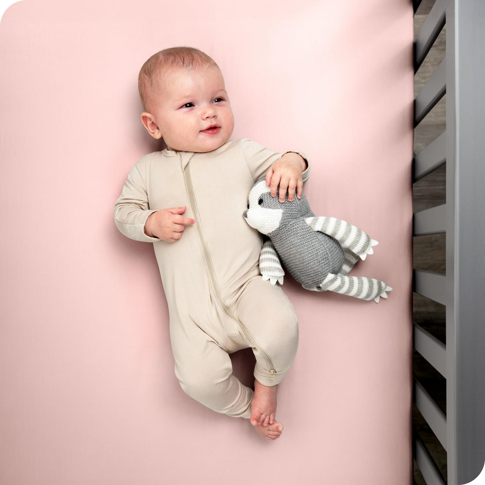Bare Home fitted crib sheet elastic edge for secure mattress fit.