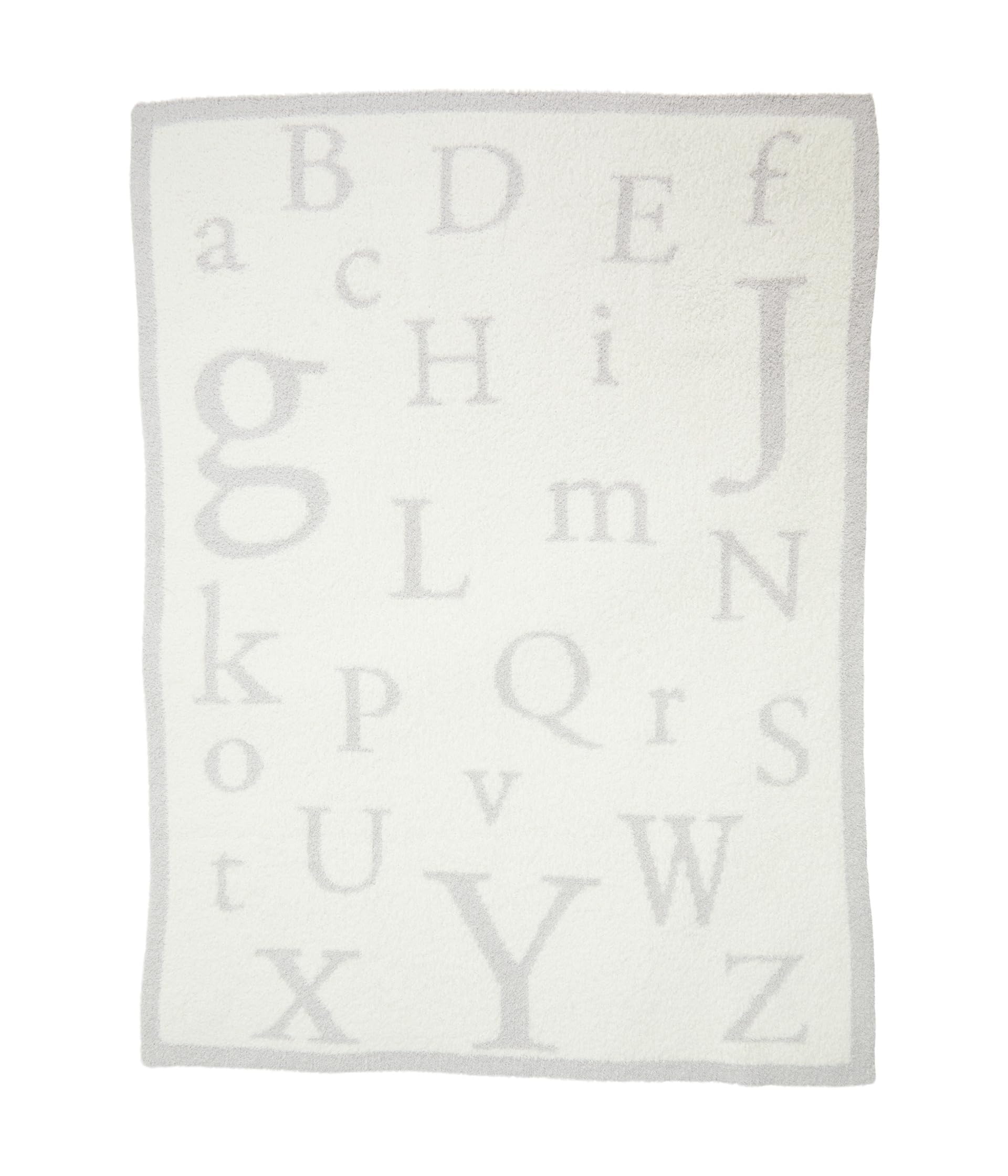 Barefoot Dreams CozyChic ABC Blanket cuddled by child during reading time.