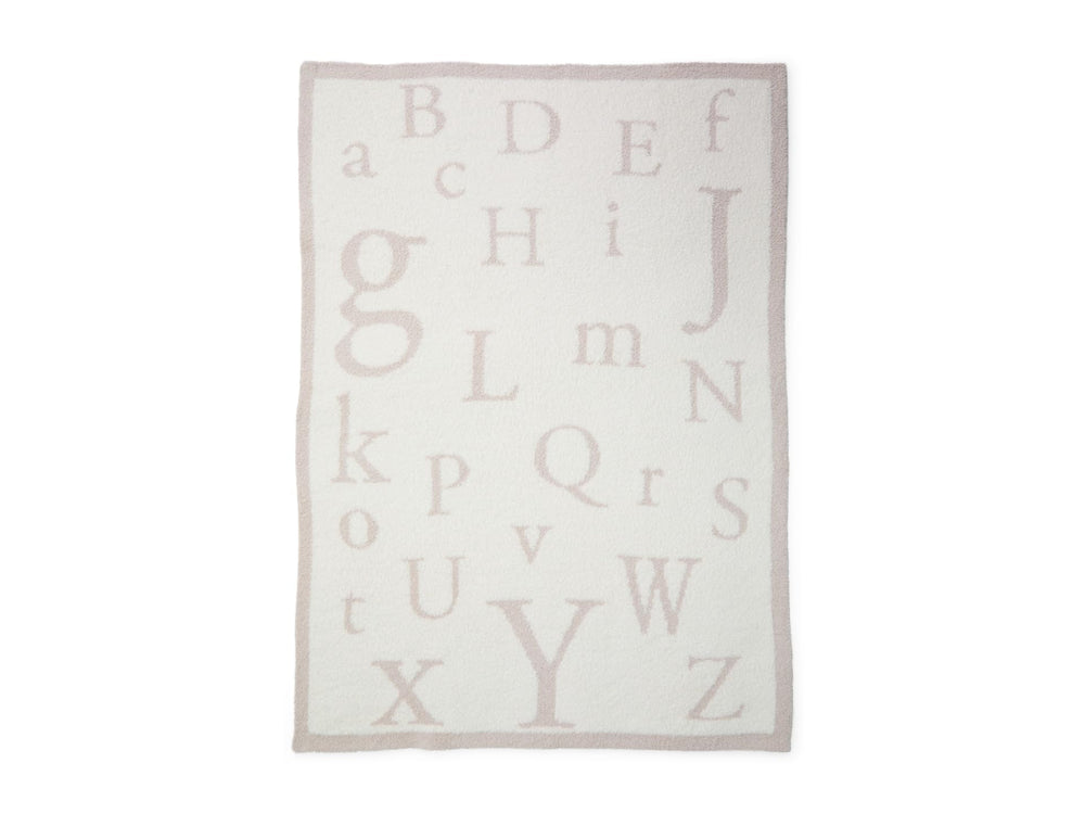 Barefoot Dreams CozyChic ABC Blanket Stone-Cream fabric detail highlights soft microfiber texture for baby comfort.