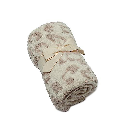 Barefoot Dreams CozyChic jacquard detail closeup; exotic pattern elevates nursery decor.