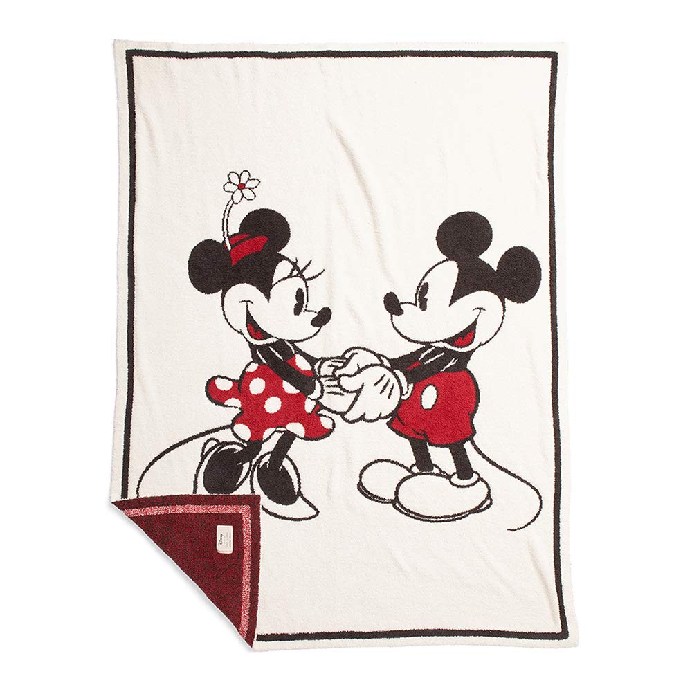 Barefoot Dreams CozyChic Disney blanket closeup reveals plush texture for soothing baby snuggles.