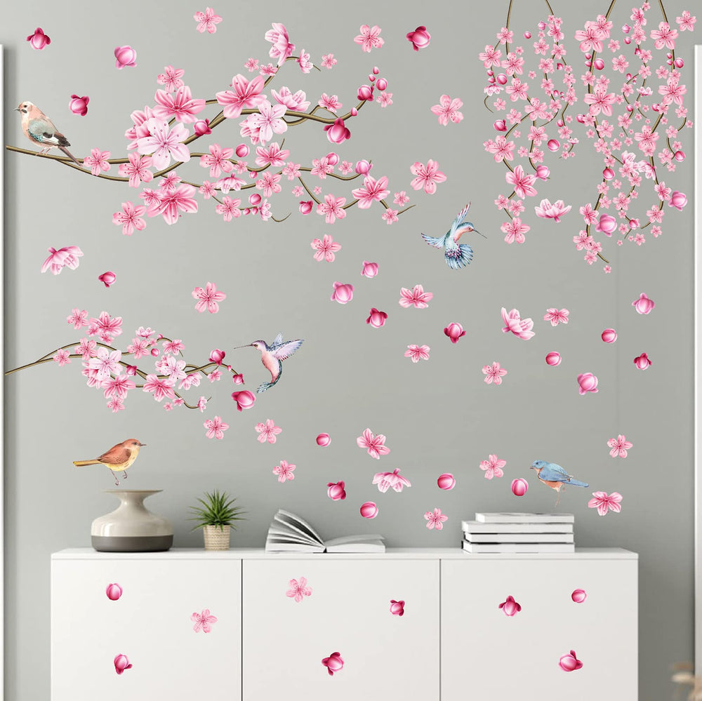 Barri Design Cherry Blossom wall sticker pink tree branch creates playful nursery decor.