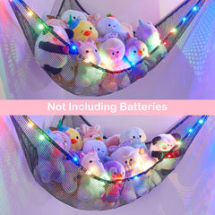 Basumee stuffed animals hammock corner setup demonstrates space saving wall storage.