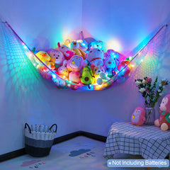 Basumee stuffed animals hammock in nursery keeps toys tidy and reachable.