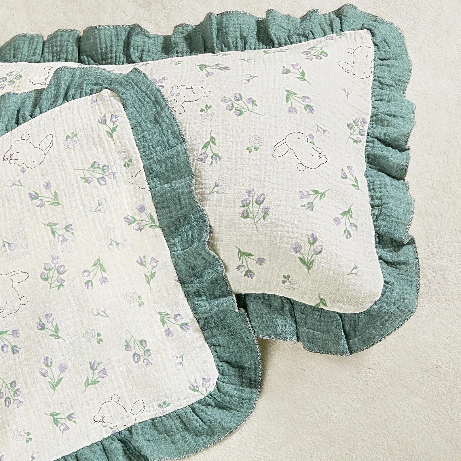 Basumee toddler pillowcase in muslin green bunny folded for a soft, breathable feel.