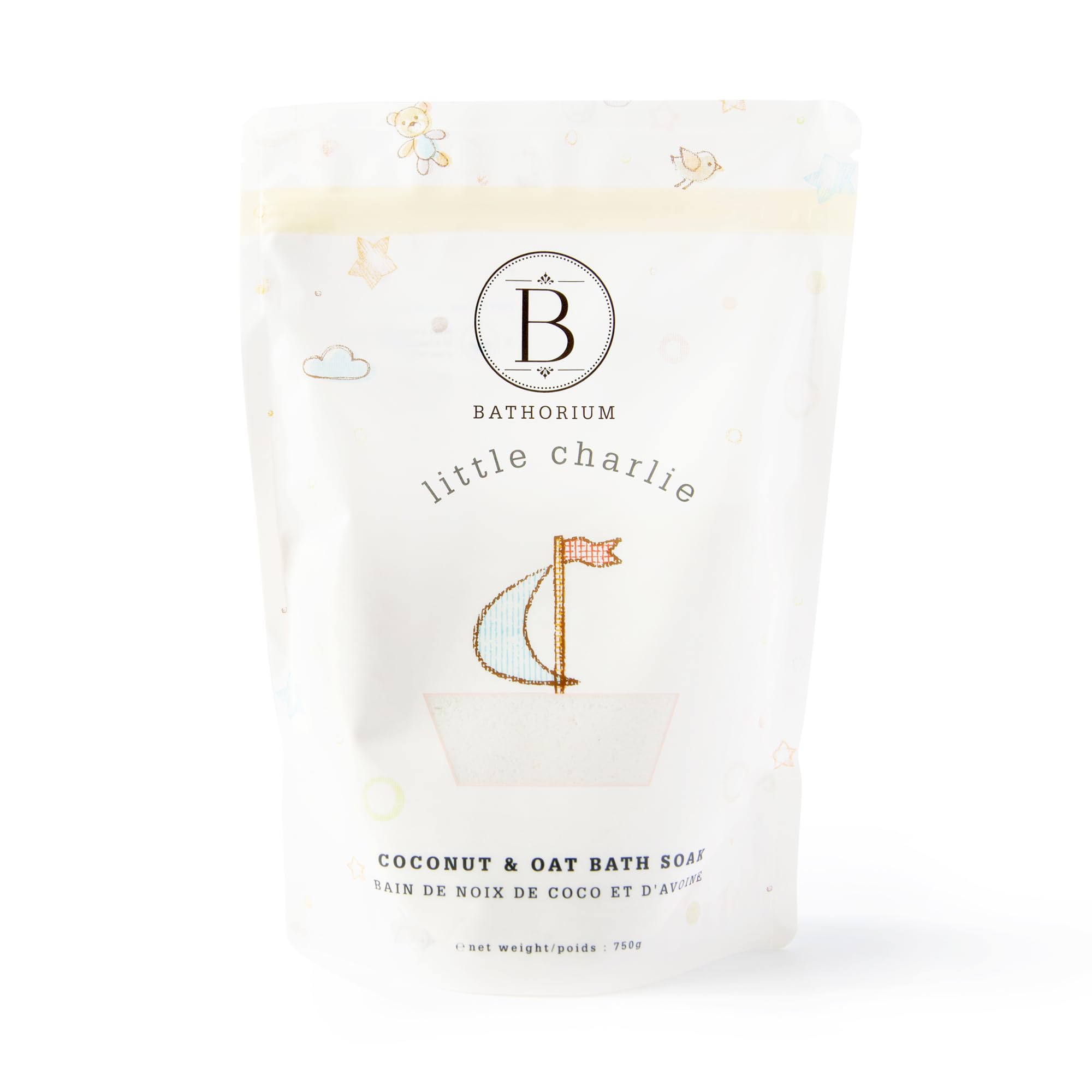 Bathorium Little Charlie Bath Soak bottle pour showing nourishing ingredients for delicate baby skin