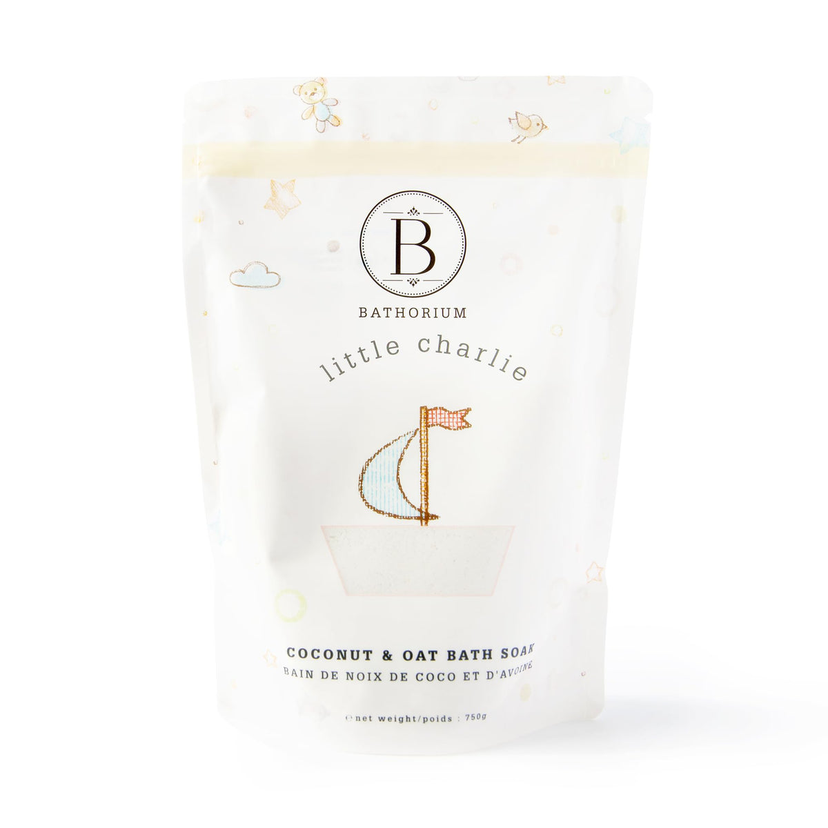 Bathorium Little Charlie Bath Soak bottle pour showing nourishing ingredients for delicate baby skin