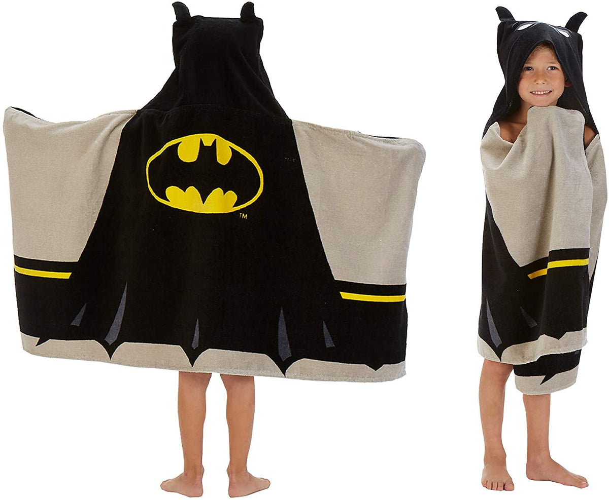 DC Comics Batman hooded towel bath wrap shown on a child model, cozy after bath.