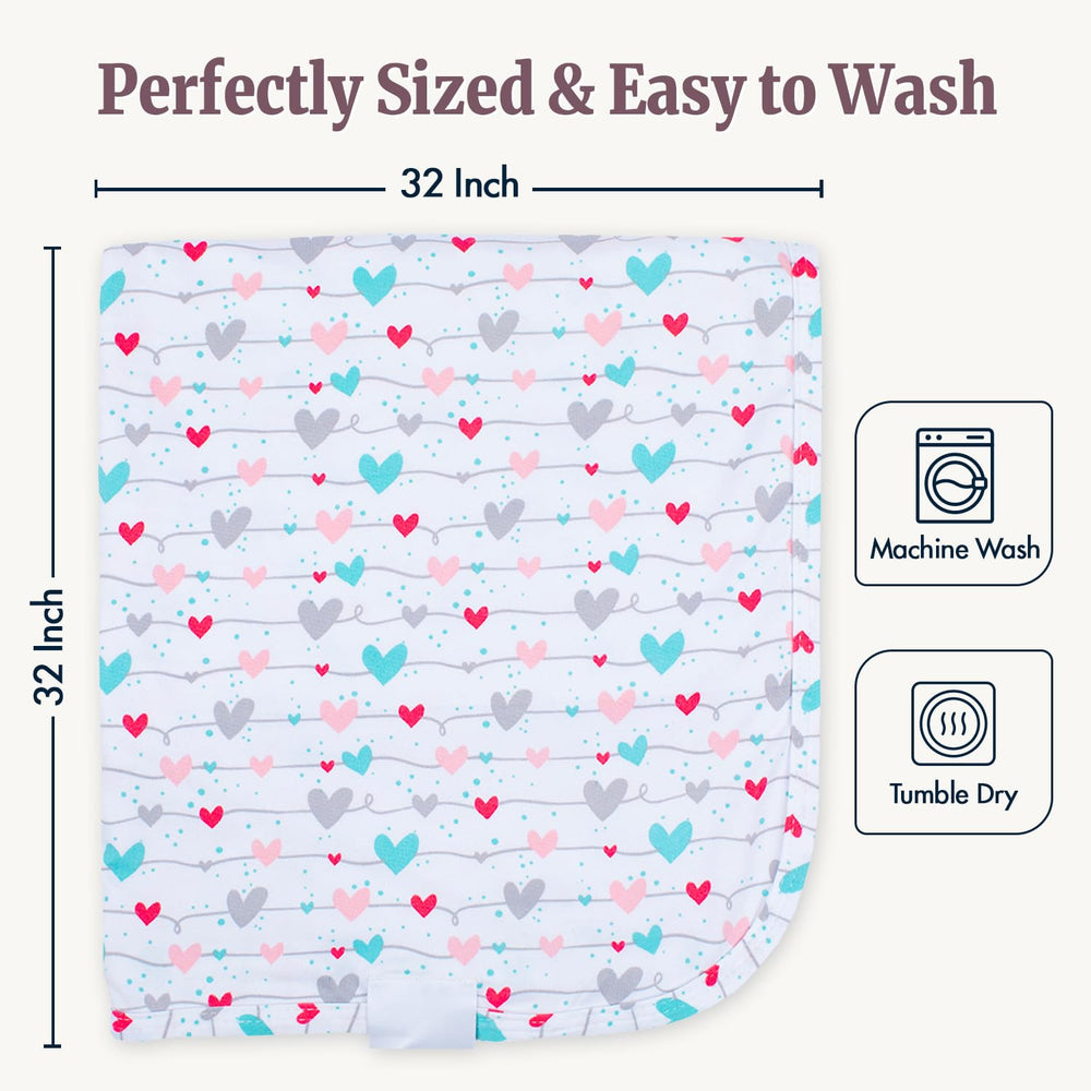 Bazzle Baby Sweetheart swaddle demonstrates stretchy wrap for snug, secure swaddling.