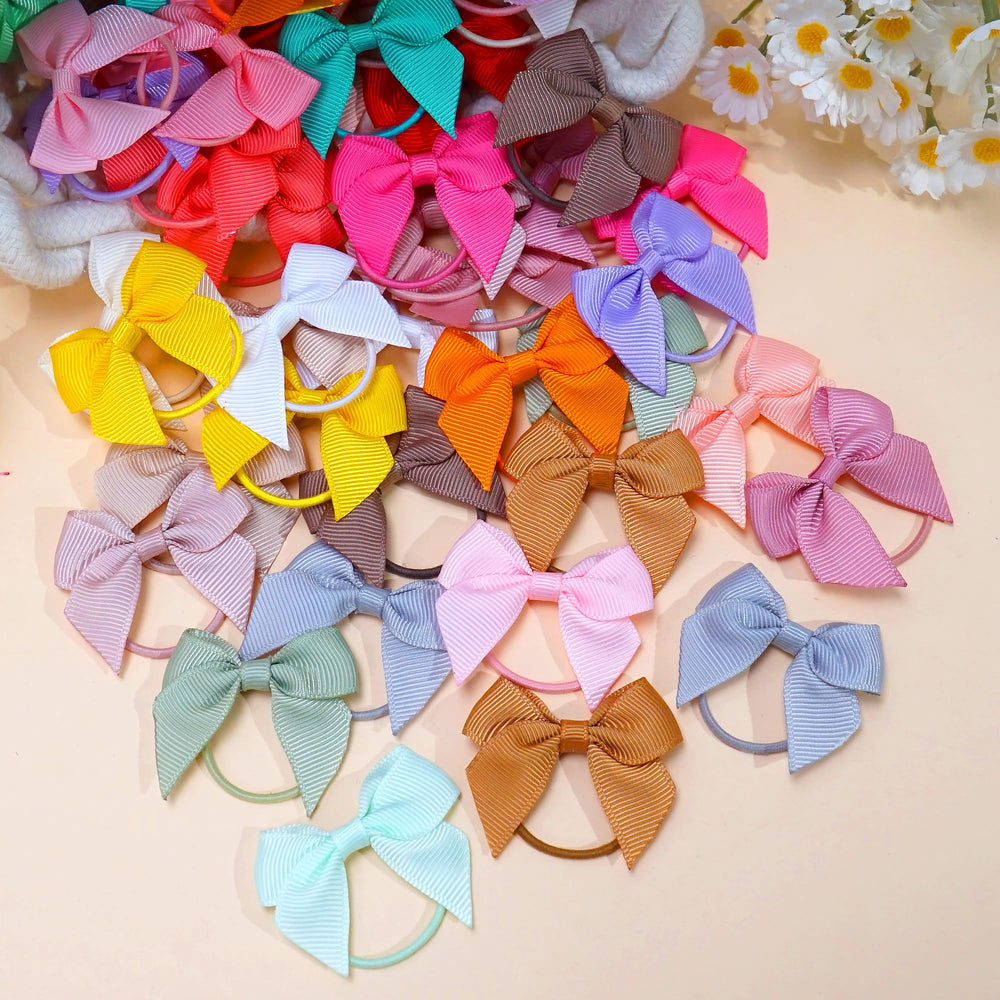 BBGifts baby hair ties in use during school and play