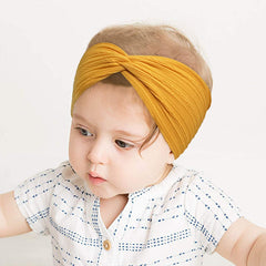 BBGifts elastic headbands stretched over growing babies up to 10 inches