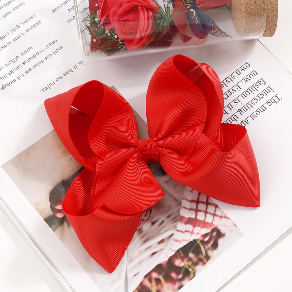 BBGifts pack-ready display of four red-pink bows.