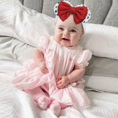 BBGifts red bow white spots fabric closeup perfect party outfit