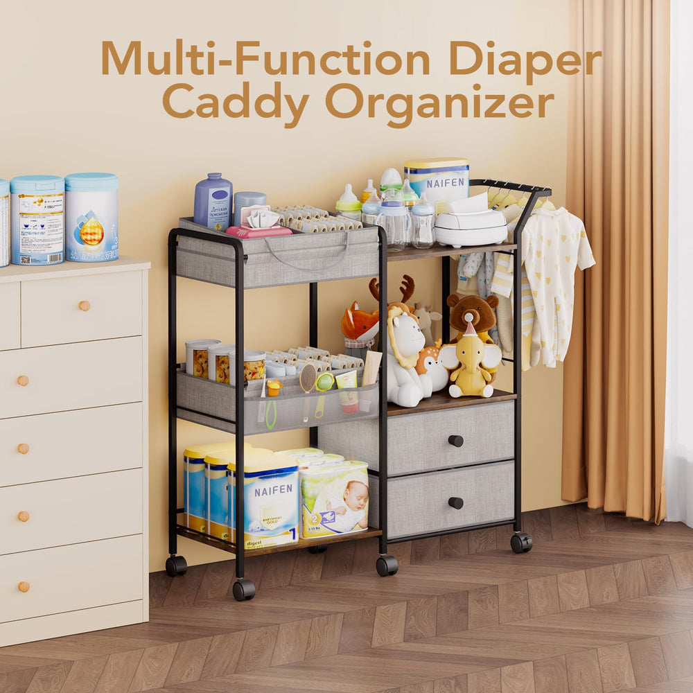 BBLIKE diaper caddy side pockets help organize bibs and small outfits.