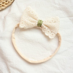 BBTDIN hollow-out bow headband adds delicate charm to newborn looks