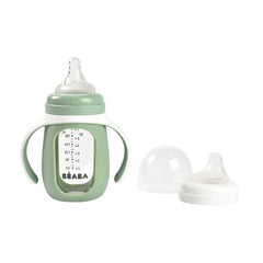 Beaba 2-in-1 glass bottle to sippy cup in Sage promotes a seamless toddler transition.