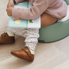 Beaba compact toddler potty sage top-view illustrates space-saving design for small bathrooms.