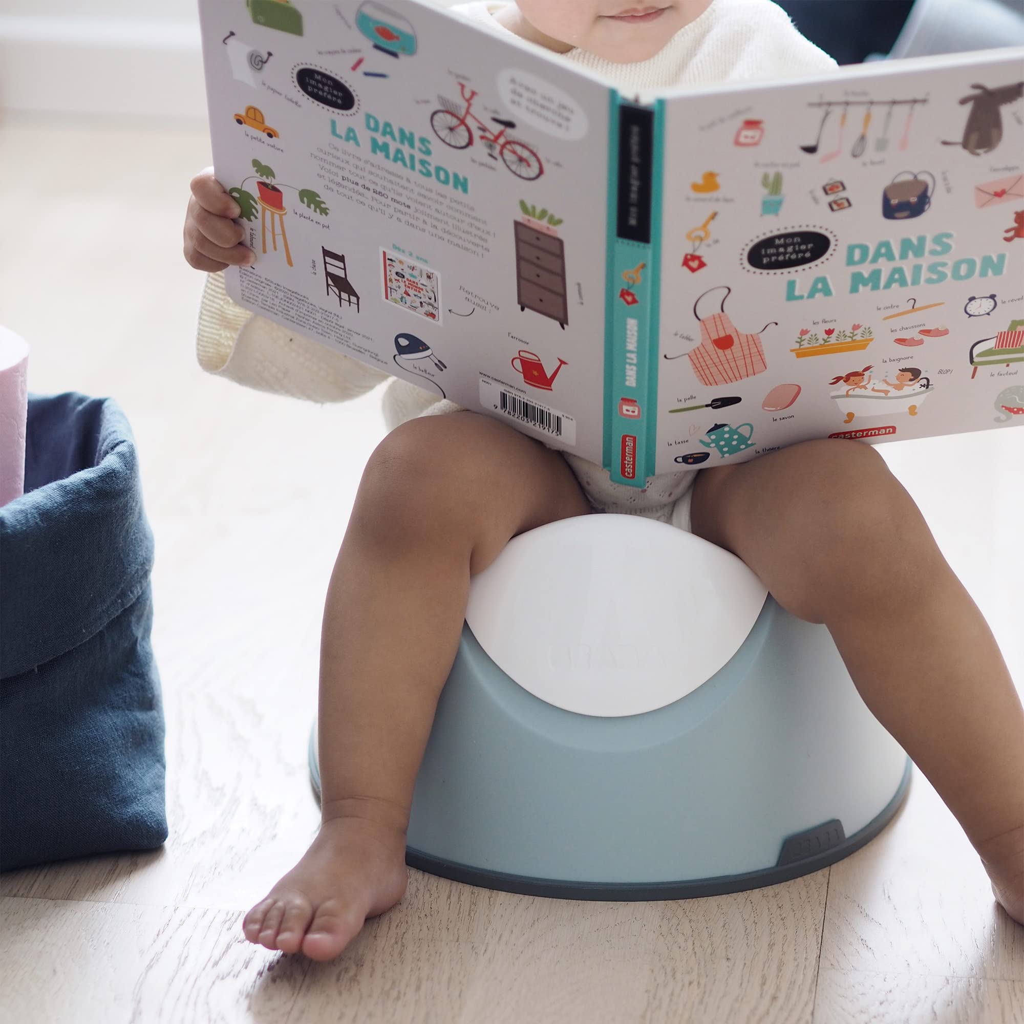 Beaba potty includes a back carry handle for portability and stability.