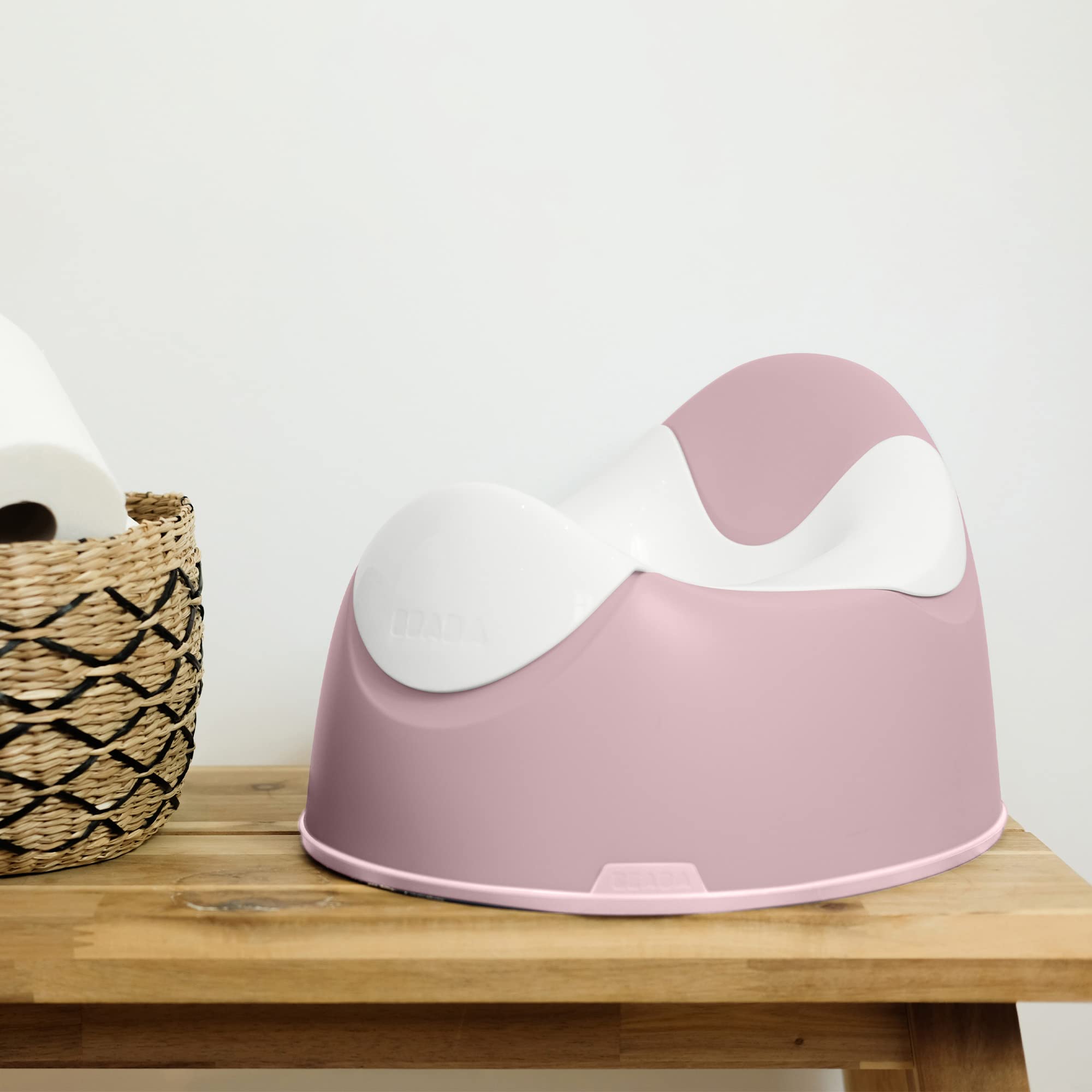 BEABA Ergonomic Training Potty rose easy-clean design resists grime after use.
