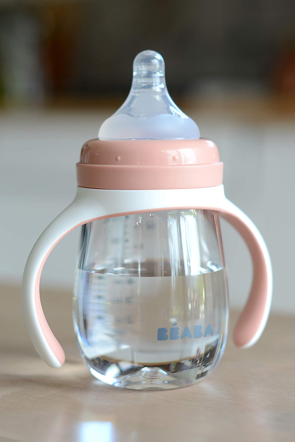 BEABA removable-handles-growth illustrates adjustable grip for developing toddlers.