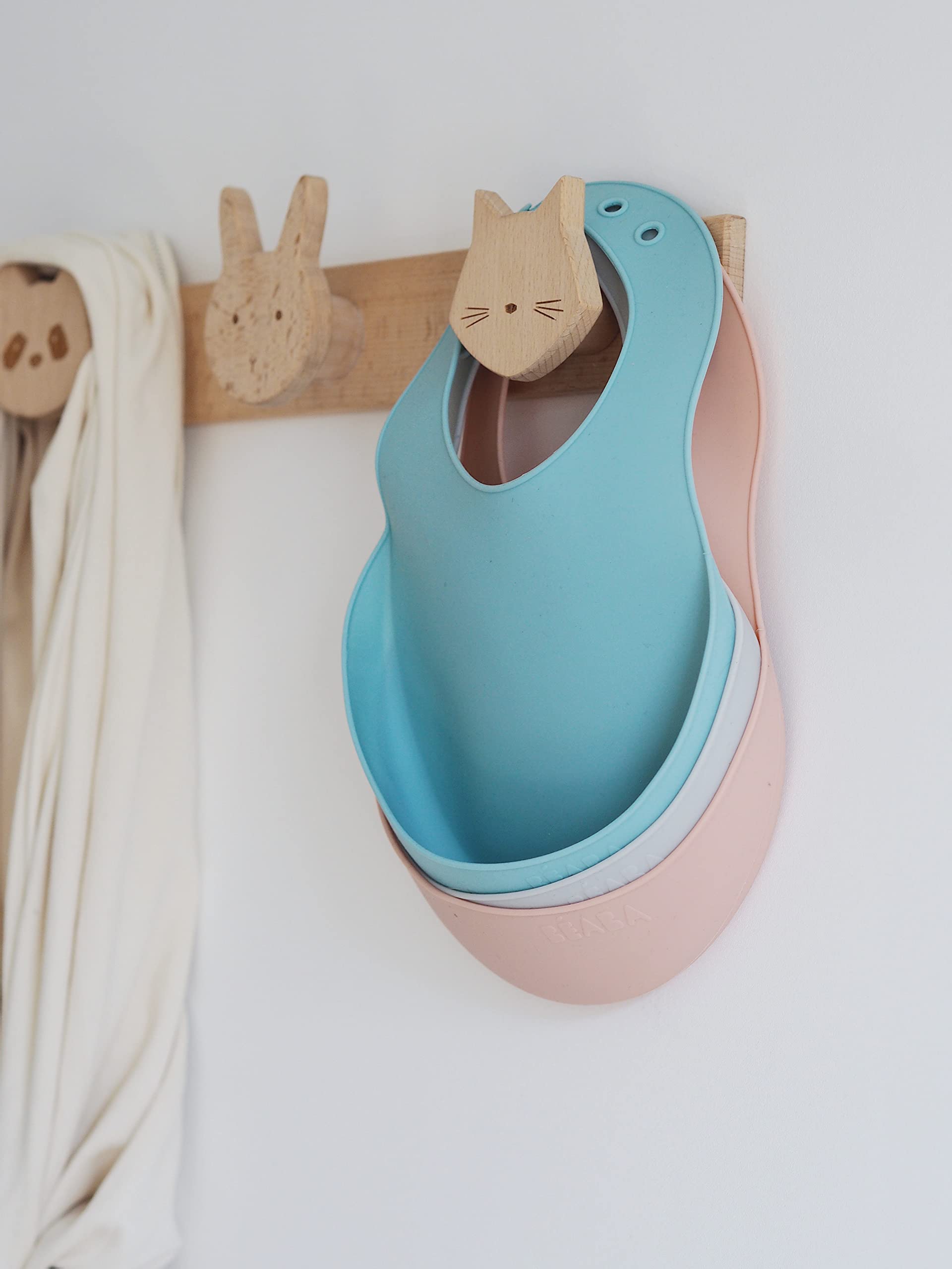 Beaba Rose bib safely guards against mess with soft silicone and comfy fit.