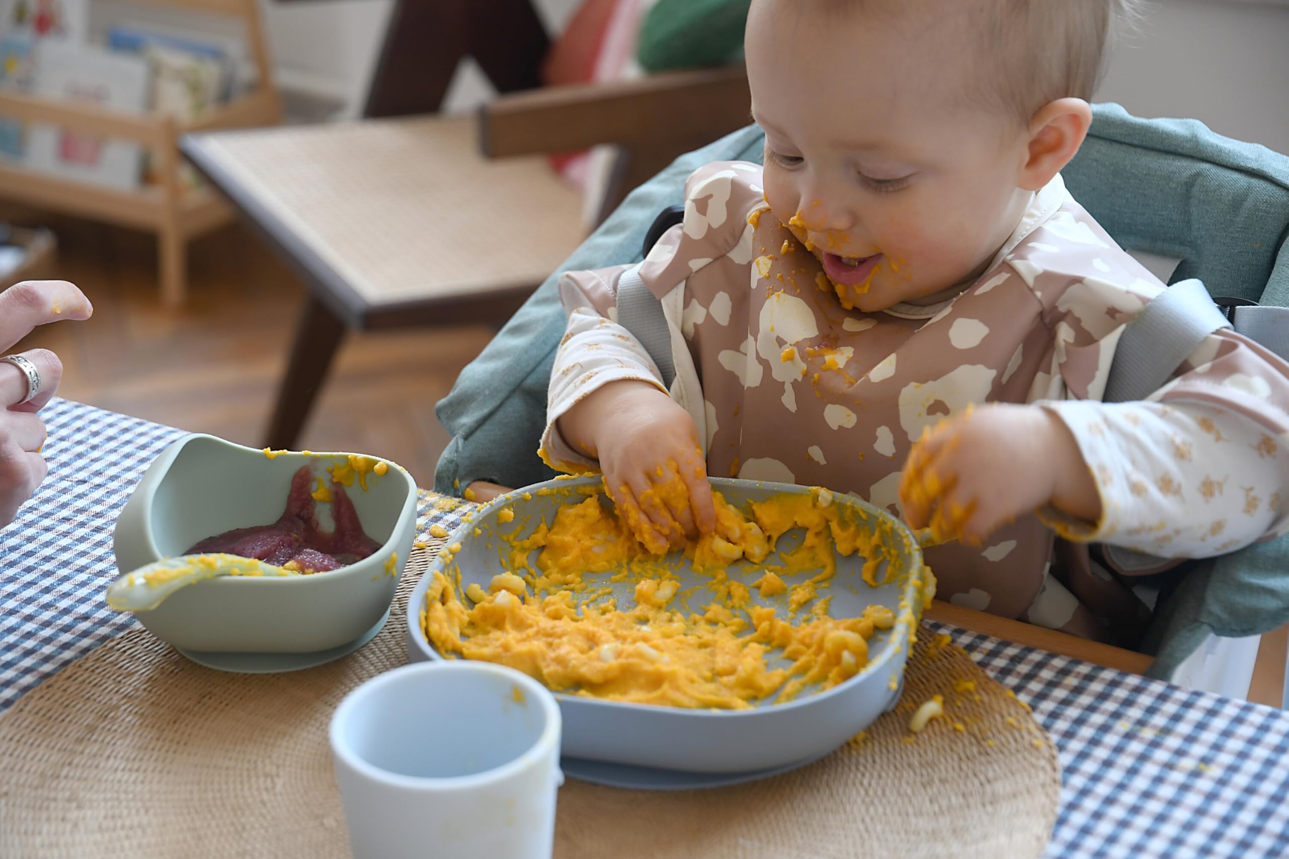 Beaba silicone baby cup Rain with easy-grip handle for small hands.