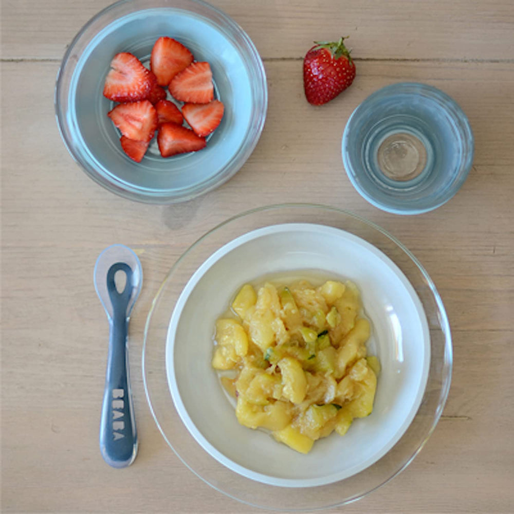 Beaba suction pad on table enables firm grip during feeding.