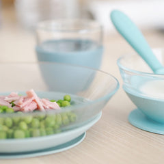 Beaba toddler plate high rim design aids scooping.