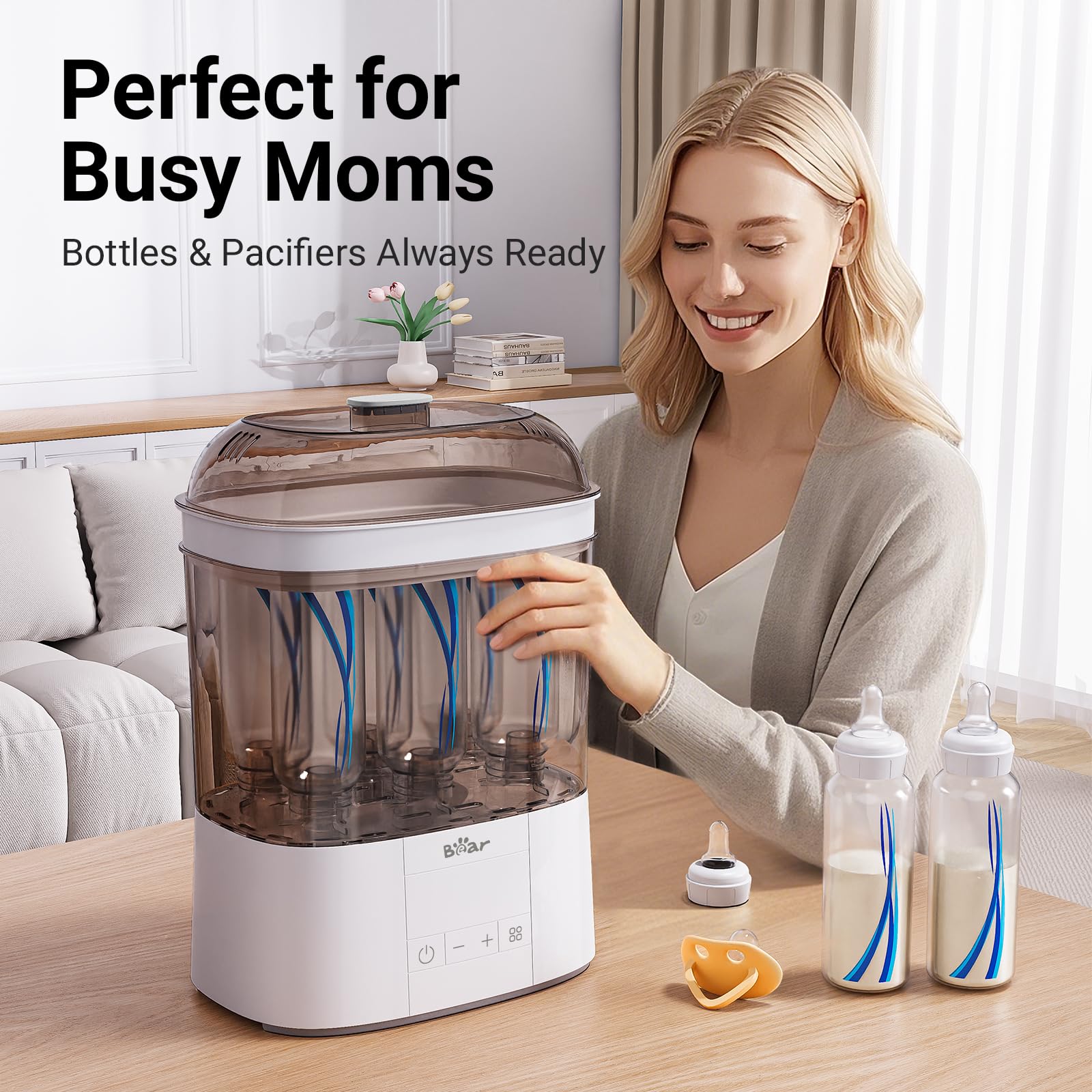 Bear Bottle Sterilizer with open lid showing adjustable racks for bottles