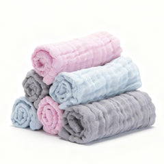 Bear Rocket organic muslin washcloth grey closeup shows ultra-soft texture for delicate newborn skin.