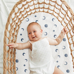 Bearmoss bassinet sheets feature an elastic edge for snug hold.